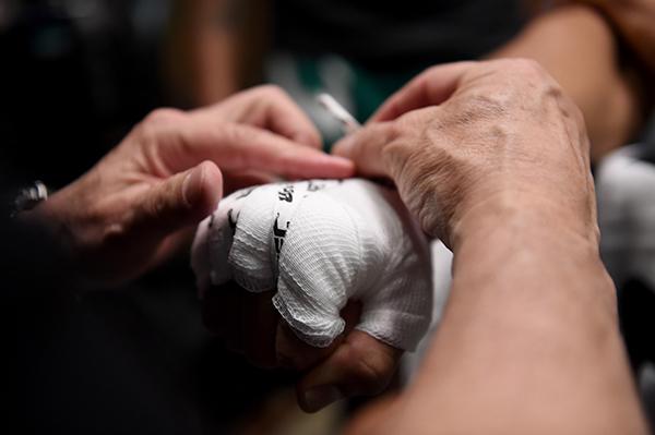 LAS VEGAS, NV - APRIL 21: Hector Aldana gets his hands wrapped before facing Enrique Marin in the semi-finals during the filming of The Ultimate Fighter Latin America: Team Gastelum vs Team Escudero on April 21, 2015 in Las Vegas, Nevada. (Photo by Bran