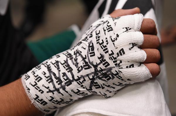 LAS VEGAS, NV - APRIL 21: Hector Aldana gets his hands wrapped before facing Enrique Marin in the semi-finals during the filming of The Ultimate Fighter Latin America: Team Gastelum vs Team Escudero on April 21, 2015 in Las Vegas, Nevada. (Photo by Bran