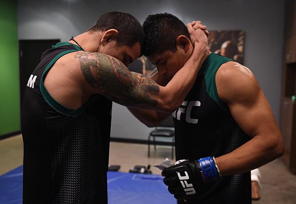 LAS VEGAS, NV - APRIL 21: Hector Aldana sits quietly in the locker room before facing Enrique Marin in the semi-finals during the filming of The Ultimate Fighter Latin America: Team Gastelum vs Team Escudero on April 21, 2015 in Las Vegas, Nevada. (Phot