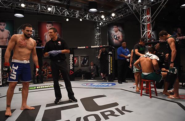 LAS VEGAS, NV - APRIL 21: (L-R) Enrique Marin celebrates his submission victory over Hector Aldana in the semi-finals during the filming of The Ultimate Fighter Latin America: Team Gastelum vs Team Escudero on April 21, 2015 in Las Vegas, Nevada. (Photo