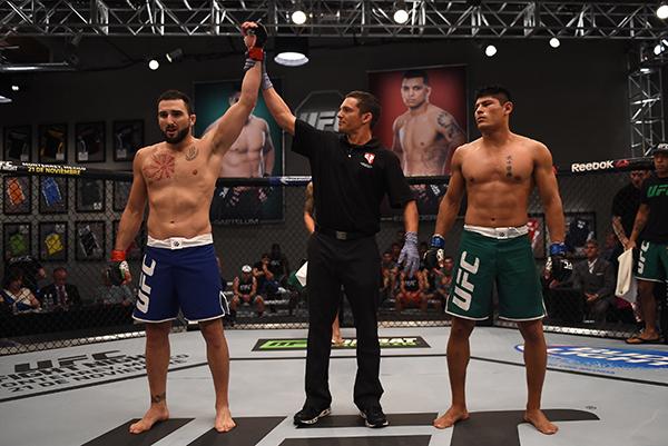 LAS VEGAS, NV - APRIL 21: (L-R) Enrique Marin celebrates his submission victory over Hector Aldana in the semi-finals during the filming of The Ultimate Fighter Latin America: Team Gastelum vs Team Escudero on April 21, 2015 in Las Vegas, Nevada. (Photo