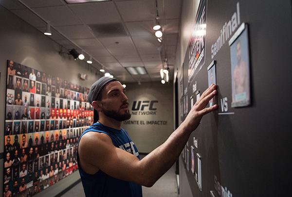 LAS VEGAS, NV - APRIL 21: Enrique Marin moves his name card into the Finals column after defeating Hector Aldana in the semi-finals during the filming of The Ultimate Fighter Latin America: Team Gastelum vs Team Escudero on April 21, 2015 in Las Vegas,