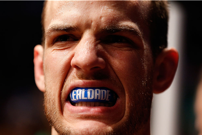 BOSTON, MA - AUGUST 17: Cole Miller prepares to enter the Octagon before his UFC featherweight bout against Manny Gamburyan at TD Garden on August 17, 2013 in Boston, Massachusetts. (Photo by Josh Hedges/Zuffa LLC/Zuffa LLC via Getty Images)