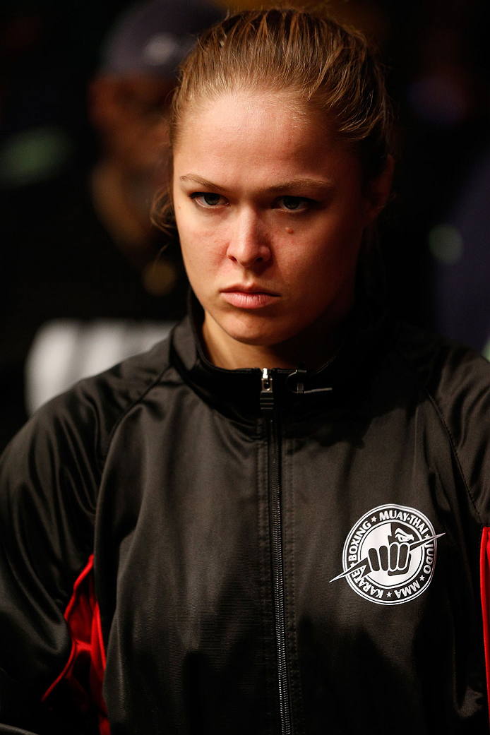 BOSTON, MA - AUGUST 17: UFC women's bantamweight champion Ronda Rousey supports teammate Manny Gamburyan during his UFC featherweight bout against Cole Miller at TD Garden on August 17, 2013 in Boston, Massachusetts. (Photo by Josh Hedges/Zuffa LLC/Zuffa