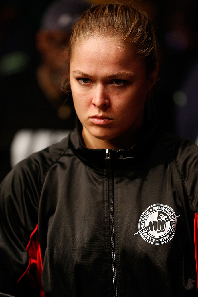 BOSTON, MA - AUGUST 17:  UFC women's bantamweight champion Ronda Rousey supports teammate Manny Gamburyan during his UFC featherweight bout against Cole Miller at TD Garden on August 17, 2013 in Boston, Massachusetts. (Photo by Josh Hedges/Zuffa LLC/Zuffa