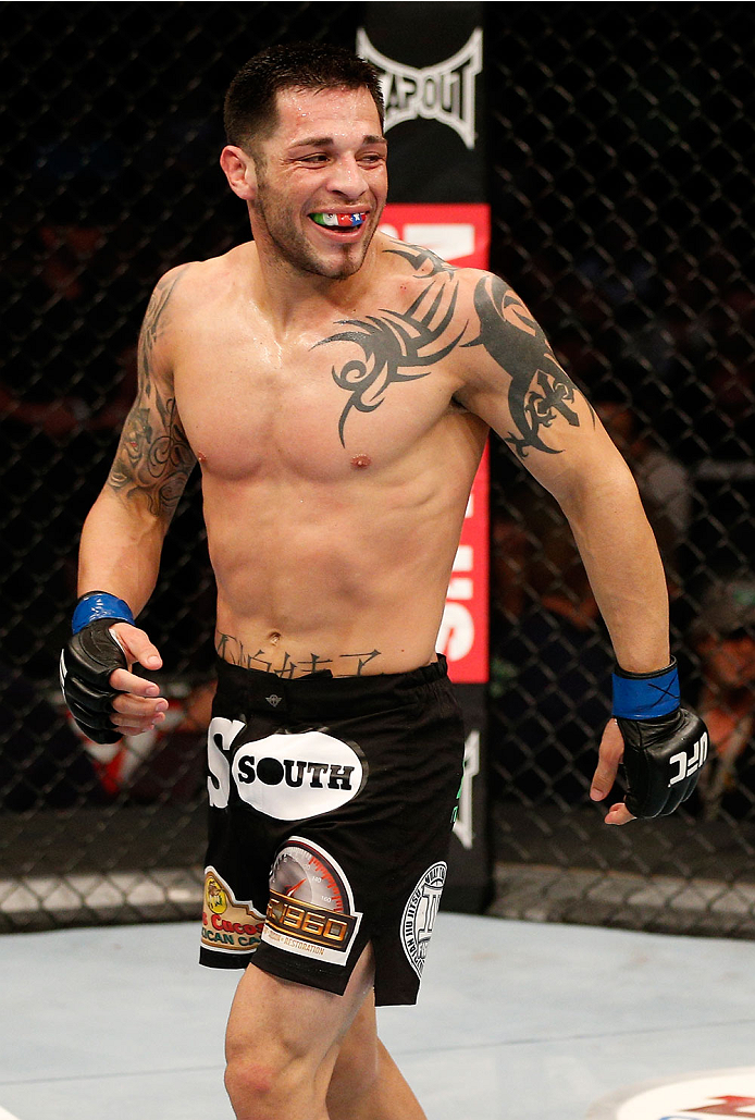 BOSTON, MA - AUGUST 17:  Daniel Pineda smiles at opponent Diego Brandao in their UFC featherweight bout at TD Garden on August 17, 2013 in Boston, Massachusetts. (Photo by Josh Hedges/Zuffa LLC/Zuffa LLC via Getty Images)