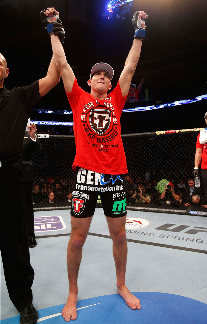 BOSTON, MA - AUGUST 17:  Steven Siler reacts after his knockout victory over Mike Brown in their UFC featherweight bout at TD Garden on August 17, 2013 in Boston, Massachusetts. (Photo by Josh Hedges/Zuffa LLC/Zuffa LLC via Getty Images)