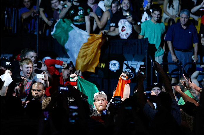 BOSTON, MA - AUGUST 17: Conor McGregor enters the arena before his UFC featherweight bout against Max Holloway at TD Garden on August 17, 2013 in Boston, Massachusetts. (Photo by Josh Hedges/Zuffa LLC/Zuffa LLC via Getty Images)