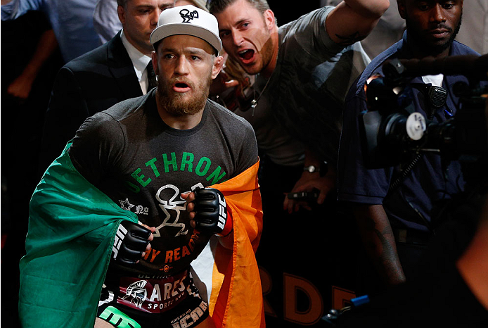 BOSTON, MA - AUGUST 17: Conor McGregor enters the arena before his UFC featherweight bout against Max Holloway at TD Garden on August 17, 2013 in Boston, Massachusetts. (Photo by Josh Hedges/Zuffa LLC/Zuffa LLC via Getty Images)