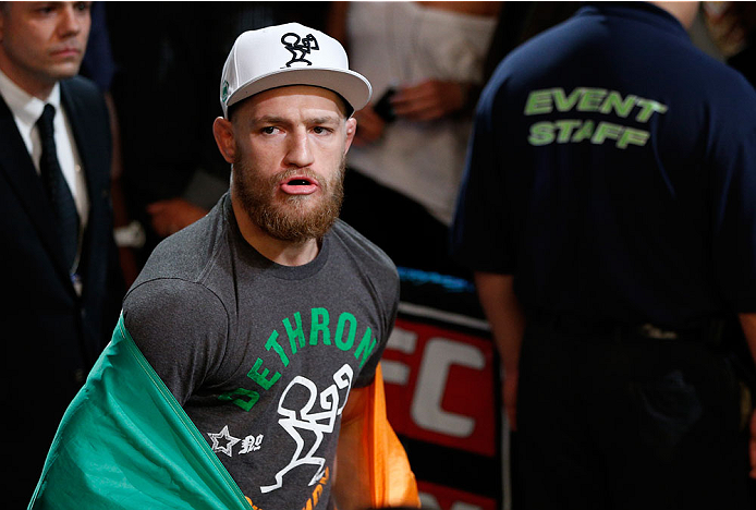 BOSTON, MA - AUGUST 17: Conor McGregor enters the arena before his UFC featherweight bout against Max Holloway at TD Garden on August 17, 2013 in Boston, Massachusetts. (Photo by Josh Hedges/Zuffa LLC/Zuffa LLC via Getty Images)