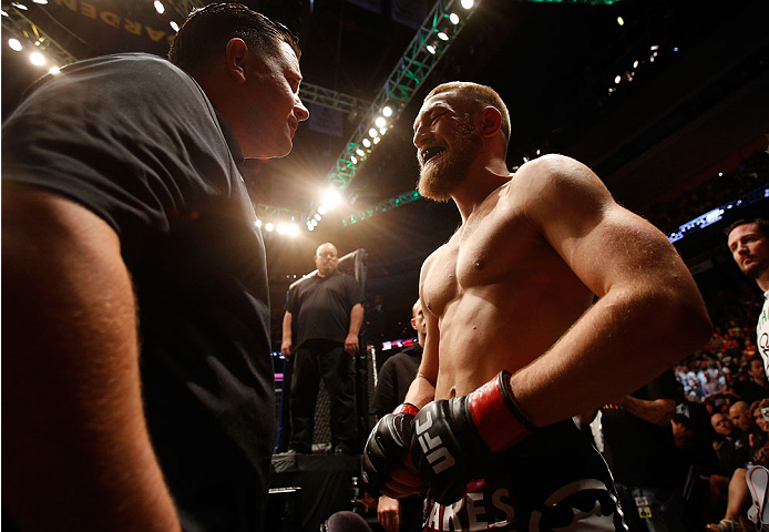 BOSTON, MA - AUGUST 17:  Conor McGregor prepares to enter the Octagon before his UFC featherweight bout against Max Holloway at TD Garden on August 17, 2013 in Boston, Massachusetts. (Photo by Josh Hedges/Zuffa LLC/Zuffa LLC via Getty Images)