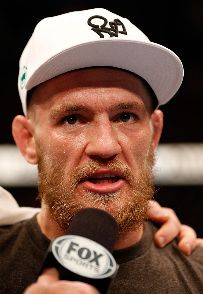 BOSTON, MA - AUGUST 17:  Conor McGregor reacts after his victory over Max Holloway in their UFC featherweight bout at TD Garden on August 17, 2013 in Boston, Massachusetts. (Photo by Josh Hedges/Zuffa LLC/Zuffa LLC via Getty Images)