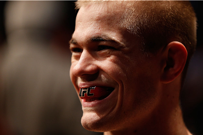 BOSTON, MA - AUGUST 17: Michael McDonald prepares to enter the Octagon before his UFC bantamweight bout against Brad Pickett at TD Garden on August 17, 2013 in Boston, Massachusetts. (Photo by Josh Hedges/Zuffa LLC/Zuffa LLC via Getty Images)