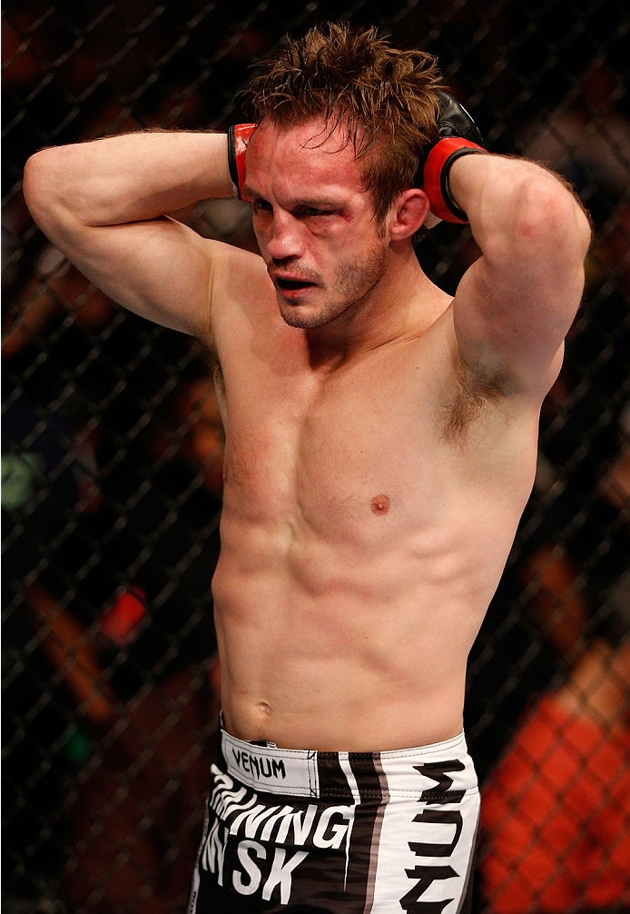 BOSTON, MA - AUGUST 17:  Brad Pickett reacts after his submission loss to Michael McDonald in their UFC bantamweight bout at TD Garden on August 17, 2013 in Boston, Massachusetts. (Photo by Josh Hedges/Zuffa LLC/Zuffa LLC via Getty Images)