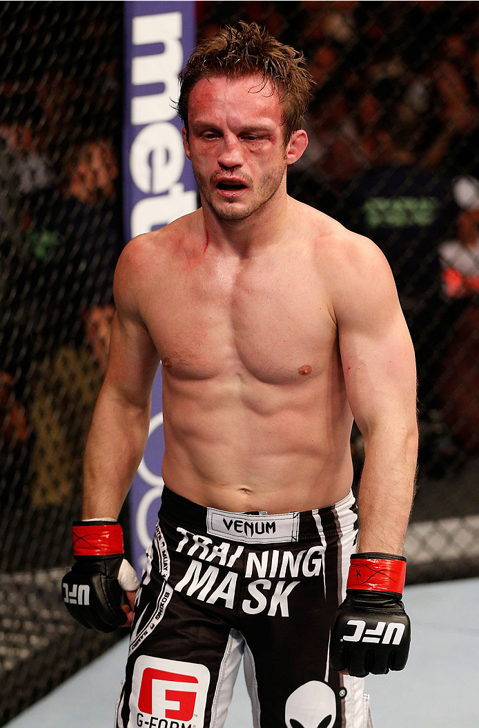 BOSTON, MA - AUGUST 17:  Brad Pickett reacts after his submission loss to Michael McDonald in their UFC bantamweight bout at TD Garden on August 17, 2013 in Boston, Massachusetts. (Photo by Josh Hedges/Zuffa LLC/Zuffa LLC via Getty Images)