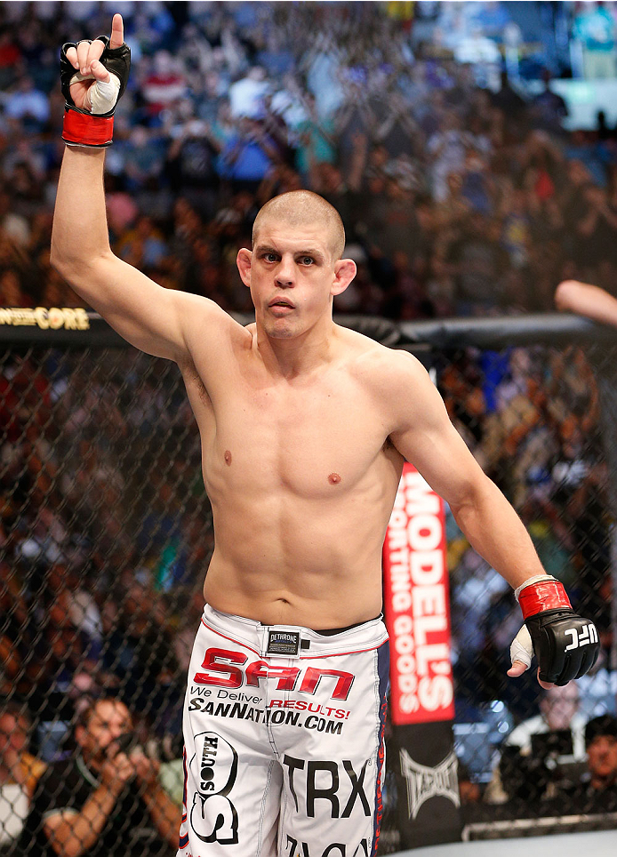 BOSTON, MA - AUGUST 17:  Boston's Joe Lauzon enters the Octagon before his UFC lightweight bout against Michael Johnson at TD Garden on August 17, 2013 in Boston, Massachusetts. (Photo by Josh Hedges/Zuffa LLC/Zuffa LLC via Getty Images)