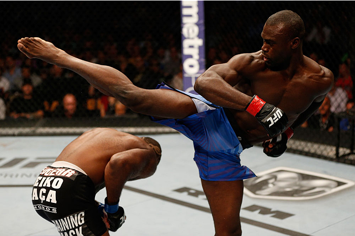 BOSTON, MA - AUGUST 17: (R-L) Uriah Hall misses with a spinning kick against John Howard in their UFC middleweight bout at TD Garden on August 17, 2013 in Boston, Massachusetts. (Photo by Josh Hedges/Zuffa LLC/Zuffa LLC via Getty Images)