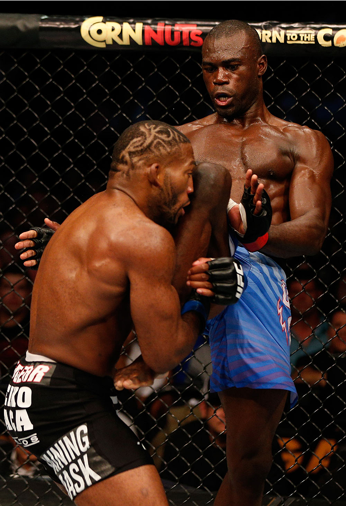 BOSTON, MA - AUGUST 17:  (R-L) Uriah Hall knees John Howard in their UFC middleweight bout at TD Garden on August 17, 2013 in Boston, Massachusetts. (Photo by Josh Hedges/Zuffa LLC/Zuffa LLC via Getty Images)