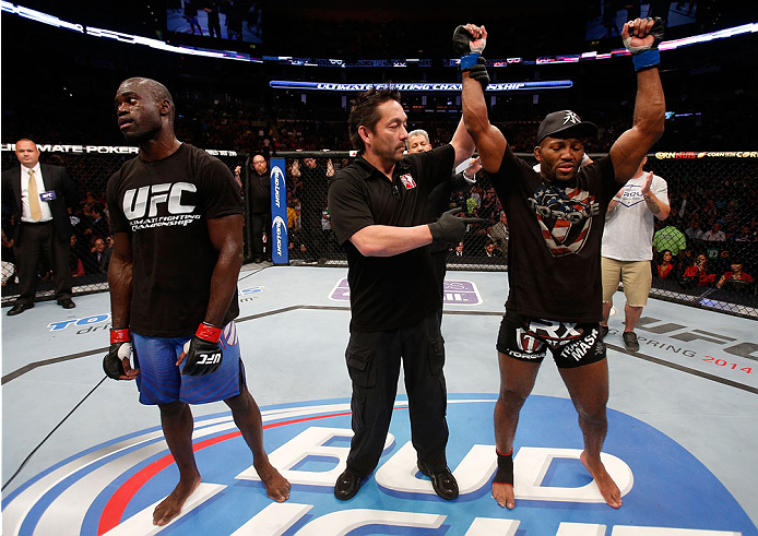 BOSTON, MA - AUGUST 17:  John Howard (R) reacts after his victory over Uriah Hall in their UFC middleweight bout at TD Garden on August 17, 2013 in Boston, Massachusetts. (Photo by Josh Hedges/Zuffa LLC/Zuffa LLC via Getty Images)