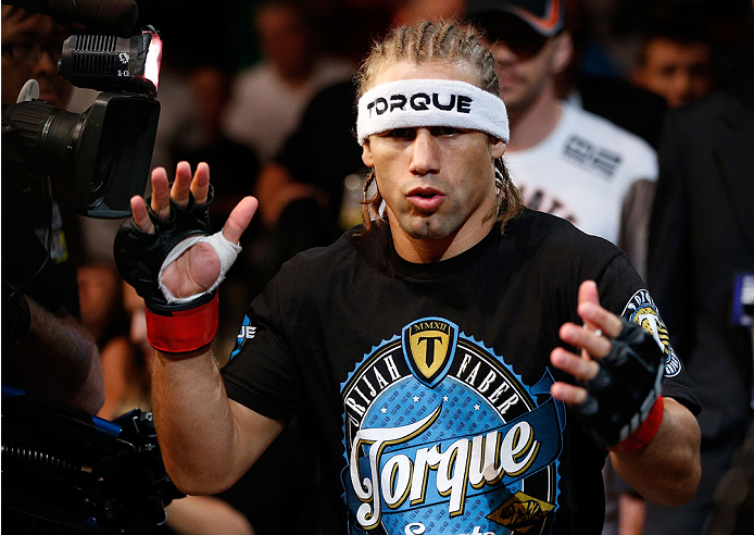 BOSTON, MA - AUGUST 17: Urijah Faber enters the arena before his UFC bantamweight bout against Iuri Alcantara at TD Garden on August 17, 2013 in Boston, Massachusetts. (Photo by Josh Hedges/Zuffa LLC/Zuffa LLC via Getty Images)