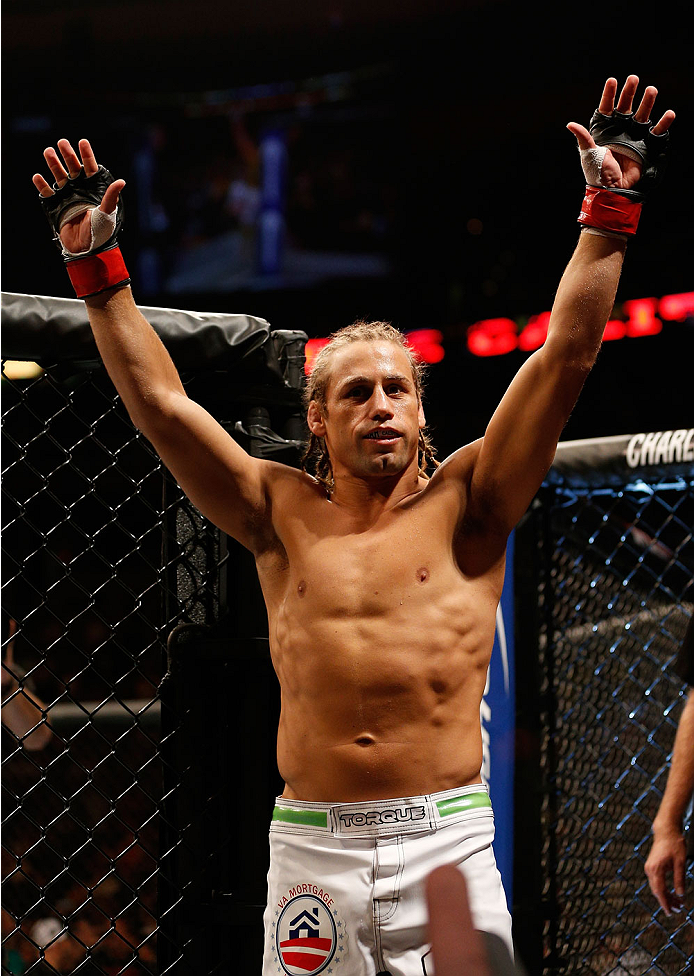 BOSTON, MA - AUGUST 17:  Urijah Faber enters the Octagon before his UFC bantamweight bout against Iuri Alcantara at TD Garden on August 17, 2013 in Boston, Massachusetts. (Photo by Josh Hedges/Zuffa LLC/Zuffa LLC via Getty Images)