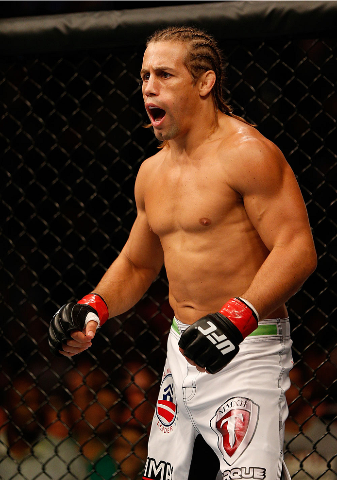 BOSTON, MA - AUGUST 17: Urijah Faber stands in the Octagon before his UFC bantamweight bout against Iuri Alcantara at TD Garden on August 17, 2013 in Boston, Massachusetts. (Photo by Josh Hedges/Zuffa LLC/Zuffa LLC via Getty Images)