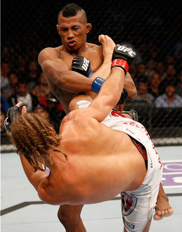 BOSTON, MA - AUGUST 17: (L-R) Urijah Faber kicks Iuri Alcantara in their UFC bantamweight bout at TD Garden on August 17, 2013 in Boston, Massachusetts. (Photo by Josh Hedges/Zuffa LLC/Zuffa LLC via Getty Images)