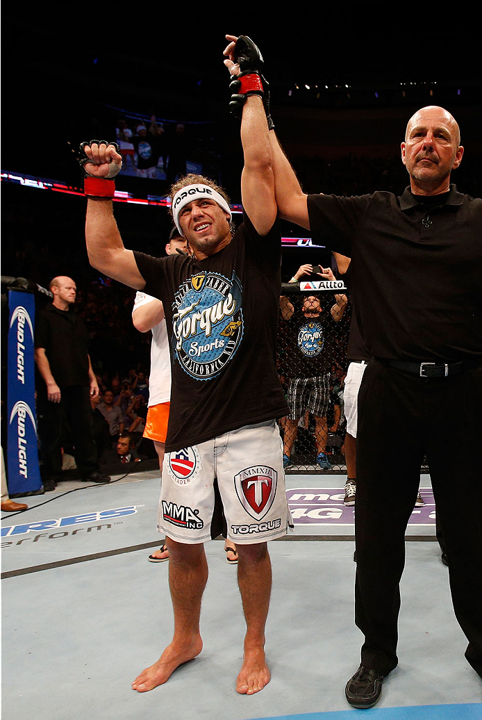 BOSTON, MA - AUGUST 17:  Urijah Faber reacts after his victory over Iuri Alcantara in their UFC bantamweight bout at TD Garden on August 17, 2013 in Boston, Massachusetts. (Photo by Josh Hedges/Zuffa LLC/Zuffa LLC via Getty Images)