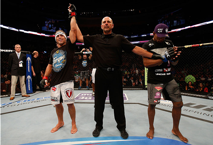 BOSTON, MA - AUGUST 17: Urijah Faber (L) reacts after his victory over Iuri Alcantara in their UFC bantamweight bout at TD Garden on August 17, 2013 in Boston, Massachusetts. (Photo by Josh Hedges/Zuffa LLC/Zuffa LLC via Getty Images)