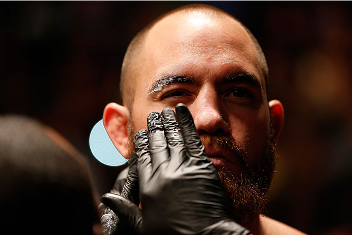 BOSTON, MA - AUGUST 17:  Travis Browne prepares to enter the Octagon before his UFC heavyweight bout against Alistair Overeem at TD Garden on August 17, 2013 in Boston, Massachusetts. (Photo by Josh Hedges/Zuffa LLC/Zuffa LLC via Getty Images)