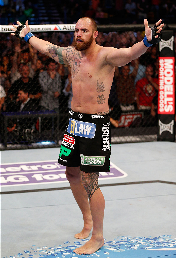 BOSTON, MA - AUGUST 17:  Travis Browne reacts after knocking out Alistair Overeem in their UFC heavyweight bout at TD Garden on August 17, 2013 in Boston, Massachusetts. (Photo by Josh Hedges/Zuffa LLC/Zuffa LLC via Getty Images)