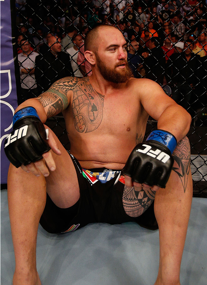 BOSTON, MA - AUGUST 17:  Travis Browne reacts after knocking out Alistair Overeem in their UFC heavyweight bout at TD Garden on August 17, 2013 in Boston, Massachusetts. (Photo by Josh Hedges/Zuffa LLC/Zuffa LLC via Getty Images)