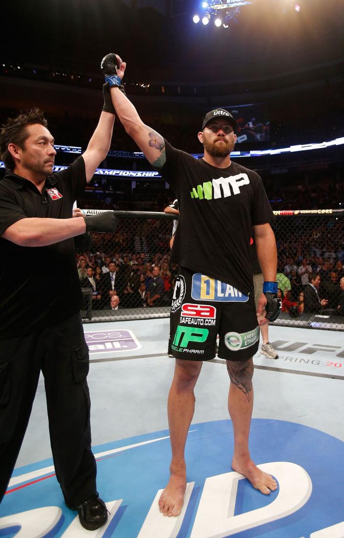 BOSTON, MA - AUGUST 17: Travis Browne reacts after knocking out Alistair Overeem in their UFC heavyweight bout at TD Garden on August 17, 2013 in Boston, Massachusetts. (Photo by Josh Hedges/Zuffa LLC/Zuffa LLC via Getty Images)