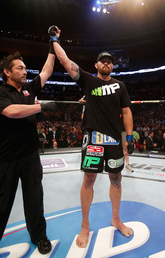 BOSTON, MA - AUGUST 17:  Travis Browne reacts after knocking out Alistair Overeem in their UFC heavyweight bout at TD Garden on August 17, 2013 in Boston, Massachusetts. (Photo by Josh Hedges/Zuffa LLC/Zuffa LLC via Getty Images)