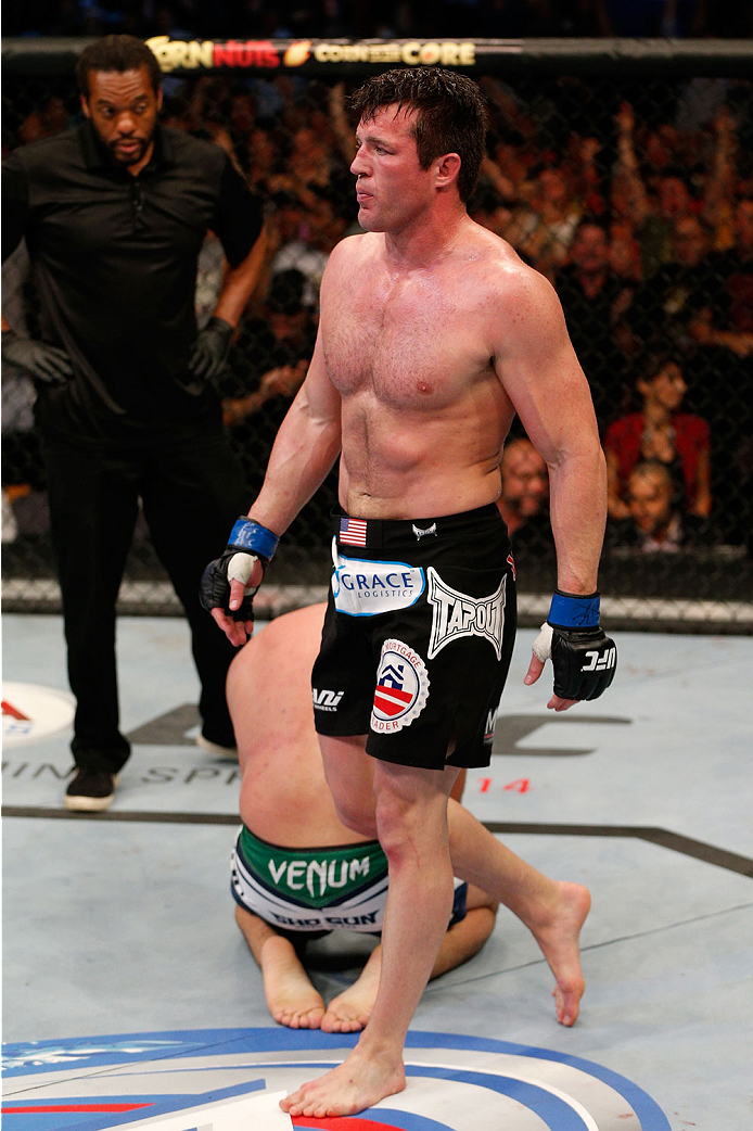 BOSTON, MA - AUGUST 17:  Chael Sonnen reacts after his submission victory over Mauricio "Shogun" Rua in their UFC light heavyweight bout at TD Garden on August 17, 2013 in Boston, Massachusetts. (Photo by Josh Hedges/Zuffa LLC/Zuffa LLC via Getty Images)