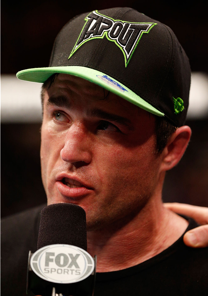 BOSTON, MA - AUGUST 17: Chael Sonnen is interviewed by Joe Rogan after his submission victory over Mauricio "Shogun" Rua in their UFC light heavyweight bout at TD Garden on August 17, 2013 in Boston, Massachusetts. (Photo by Josh Hedges/Zuffa LLC/Zuffa L