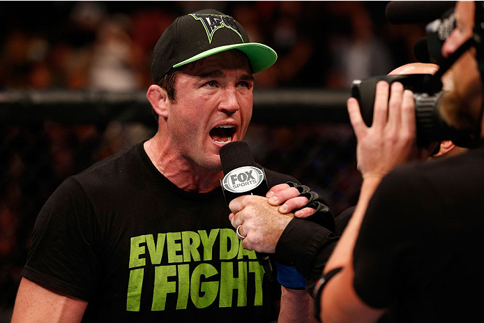 BOSTON, MA - AUGUST 17: Chael Sonnen is interviewed by Joe Rogan after his submission victory over Mauricio "Shogun" Rua in their UFC light heavyweight bout at TD Garden on August 17, 2013 in Boston, Massachusetts. (Photo by Josh Hedges/Zuffa LLC/Zuffa L