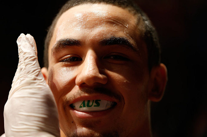 GOLD COAST, AUSTRALIA - DECEMBER 15:  Robert Whittaker prepares to enter the Octagon before his welterweight fight against Bradley Scott at the UFC on FX event on December 15, 2012  at Gold Coast Convention and Exhibition Centre in Gold Coast, Australia. 