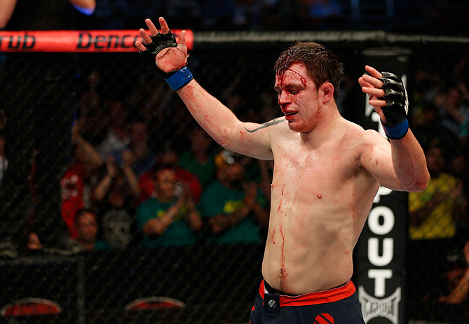 GOLD COAST, AUSTRALIA - DECEMBER 15:  Bradley Scott reacts after the conclusion of his welterweight fight against Robert Whittaker at the UFC on FX event on December 15, 2012  at Gold Coast Convention and Exhibition Centre in Gold Coast, Australia.  (Phot
