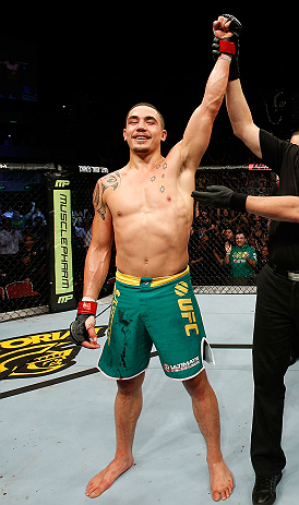 GOLD COAST, AUSTRALIA - DECEMBER 15:  Robert Whittaker reacts after defeating Bradley Scott during their welterweight fight at the UFC on FX event on December 15, 2012  at Gold Coast Convention and Exhibition Centre in Gold Coast, Australia.  (Photo by Jo
