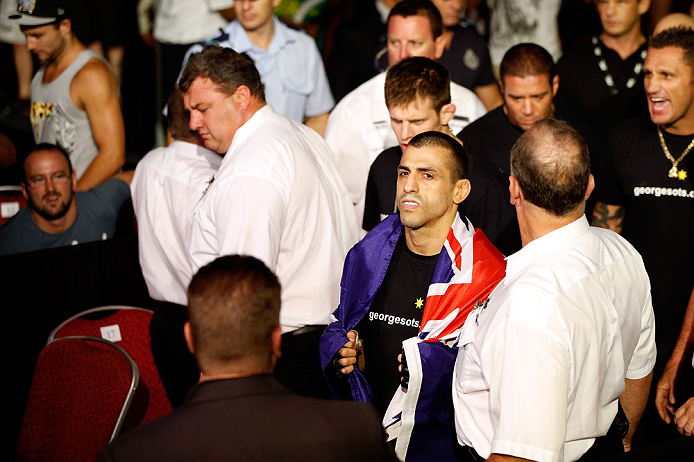 GOLD COAST, AUSTRALIA - DECEMBER 15:  George Sotiropoulos enters the arena before his lightweight fight against Ross Pearson at the UFC on FX event on December 15, 2012  at Gold Coast Convention and Exhibition Centre in Gold Coast, Australia.  (Photo by J