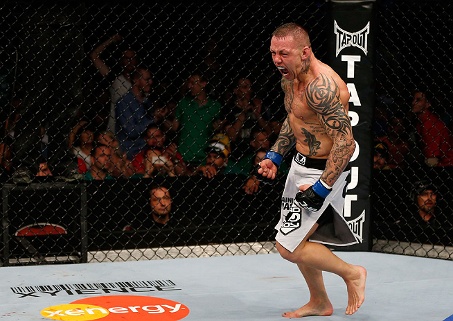 GOLD COAST, AUSTRALIA - DECEMBER 15:  Ross Pearson reacts after his knockout victory over George Sotiropoulos during their lightweight fight at the UFC on FX event on December 15, 2012  at Gold Coast Convention and Exhibition Centre in Gold Coast, Austral