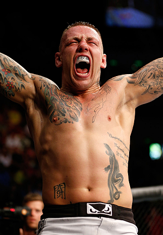 GOLD COAST, AUSTRALIA - DECEMBER 15:  Ross Pearson reacts after his knockout victory over George Sotiropoulos during their lightweight fight at the UFC on FX event on December 15, 2012  at Gold Coast Convention and Exhibition Centre in Gold Coast, Austral