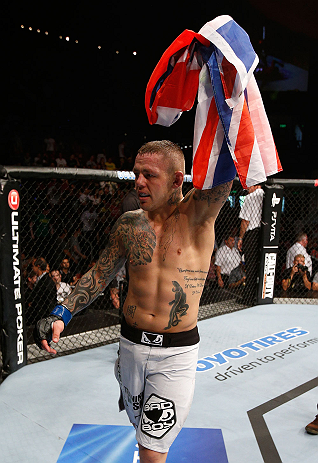 GOLD COAST, AUSTRALIA - DECEMBER 15:  Ross Pearson reacts after his knockout victory over George Sotiropoulos during their lightweight fight at the UFC on FX event on December 15, 2012  at Gold Coast Convention and Exhibition Centre in Gold Coast, Austral