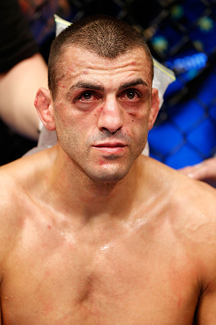 GOLD COAST, AUSTRALIA - DECEMBER 15:  George Sotiropoulos reacts after his knockout loss to Ross Pearson during their lightweight fight at the UFC on FX event on December 15, 2012  at Gold Coast Convention and Exhibition Centre in Gold Coast, Australia.  