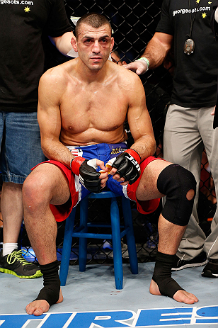 GOLD COAST, AUSTRALIA - DECEMBER 15:  George Sotiropoulos reacts after his knockout loss to Ross Pearson during their lightweight fight at the UFC on FX event on December 15, 2012  at Gold Coast Convention and Exhibition Centre in Gold Coast, Australia.  