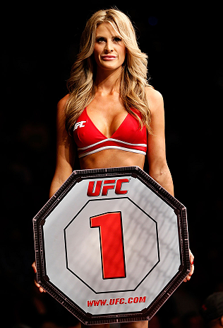 GOLD COAST, AUSTRALIA - DECEMBER 15:  UFC Octagon Girl Kristie McKeon introduces a round during the UFC on FX event on December 15, 2012  at Gold Coast Convention and Exhibition Centre in Gold Coast, Australia.  (Photo by Josh Hedges/Zuffa LLC/Zuffa LLC v
