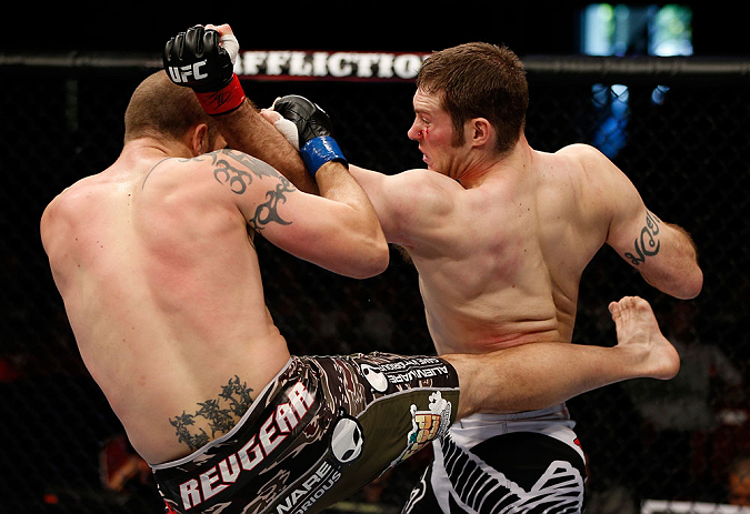 GOLD COAST, AUSTRALIA - DECEMBER 15:  (R-L) Nick Penner punches Cody Donovan during their light heavyweight fight at the UFC on FX event on December 15, 2012  at Gold Coast Convention and Exhibition Centre in Gold Coast, Australia.  (Photo by Josh Hedges/