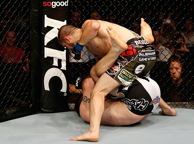 GOLD COAST, AUSTRALIA - DECEMBER 15:  (R-L) Cody Donovan punches Nick Penner during their light heavyweight fight at the UFC on FX event on December 15, 2012  at Gold Coast Convention and Exhibition Centre in Gold Coast, Australia.  (Photo by Josh Hedges/