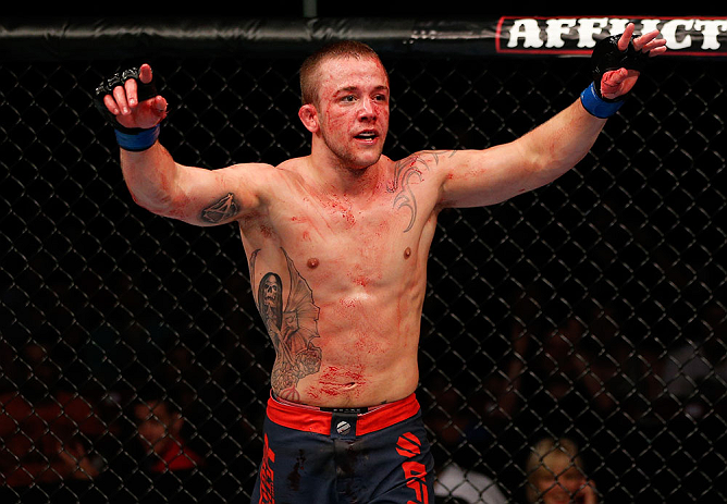 GOLD COAST, AUSTRALIA - DECEMBER 15:  Mike Wilkinson reacts after defeating Brendan Loughnane during their lightweight fight at the UFC on FX event on December 15, 2012  at Gold Coast Convention and Exhibition Centre in Gold Coast, Australia.  (Photo by J